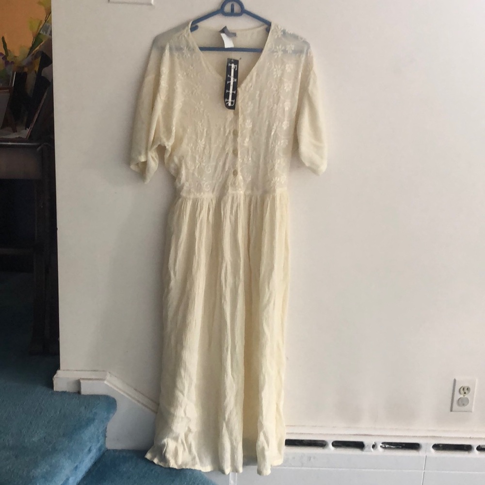 Cream color ,  Medium , long dress floral  bodice , made in India